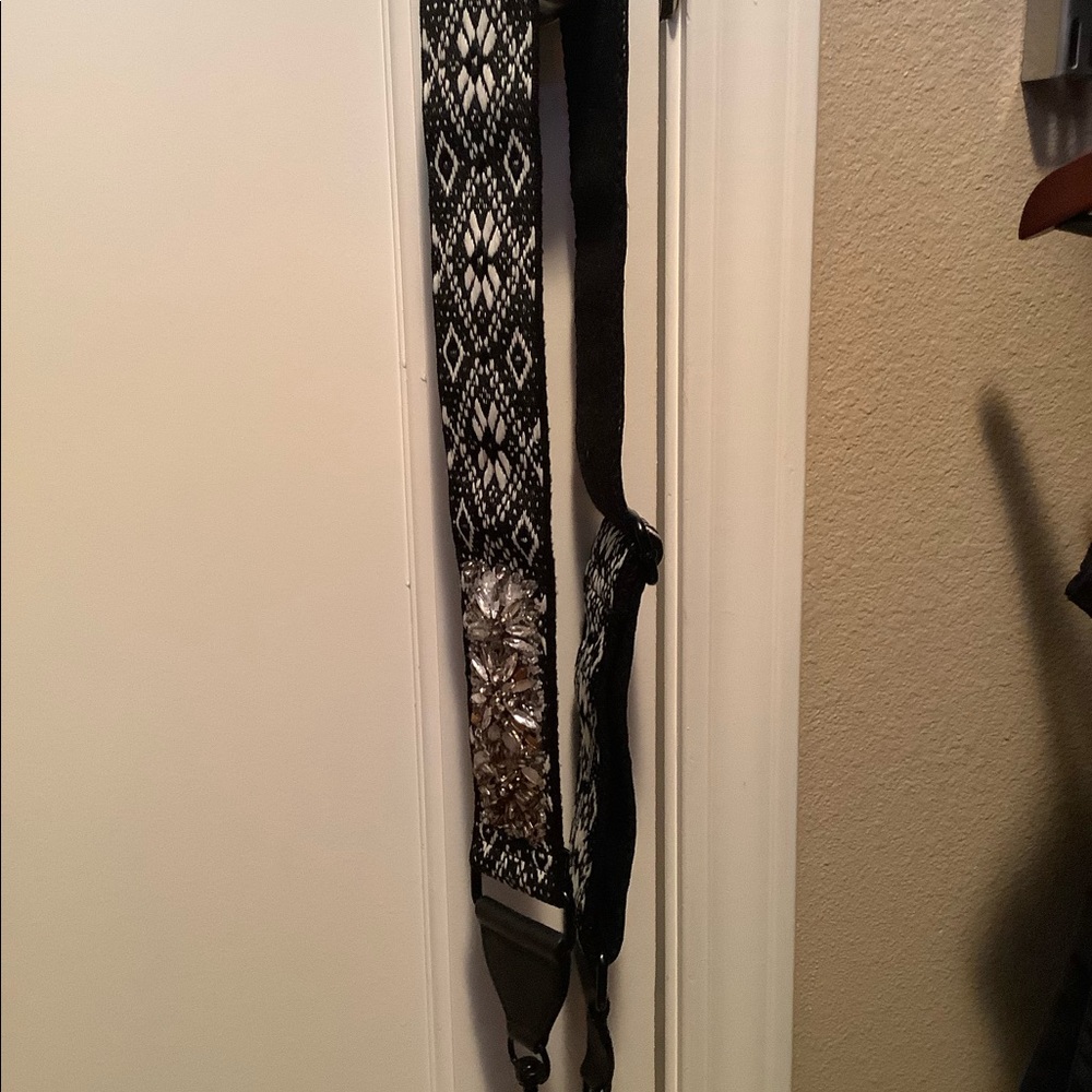 Rebecca mink off guitar bag strap